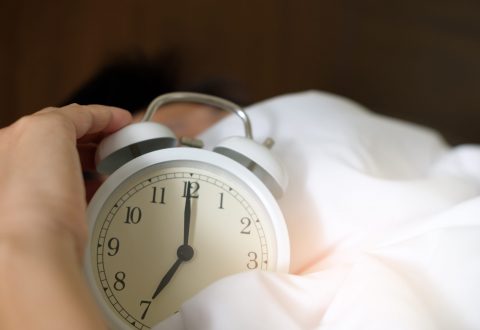 World Sleep Day Canva Photo of Person Holding Alarm Clock scaled 480x330